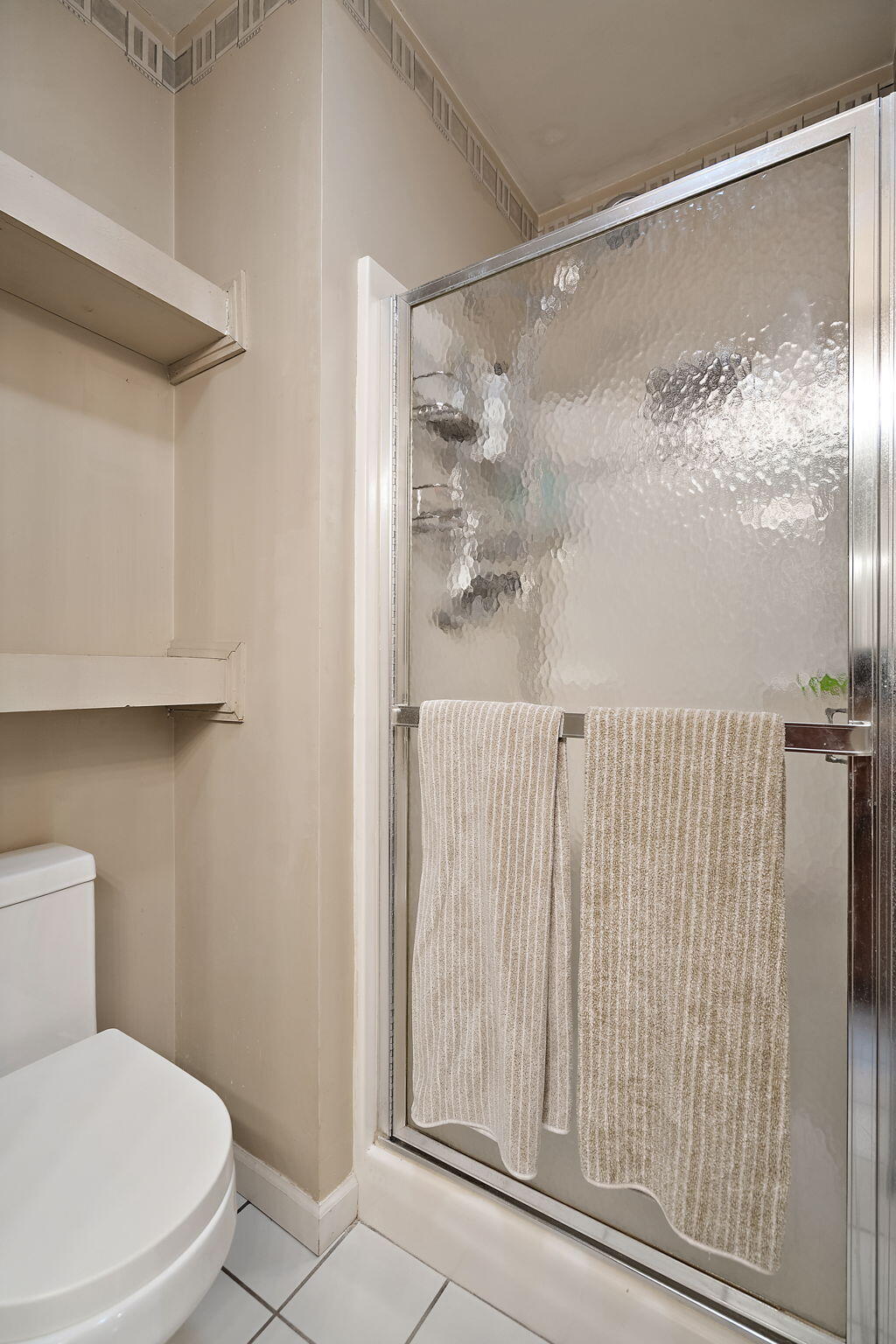 733 South Indiana Avenue Griffith, IN 46319 - Photo 31 of 48 a bathroom with a toilet and a shower