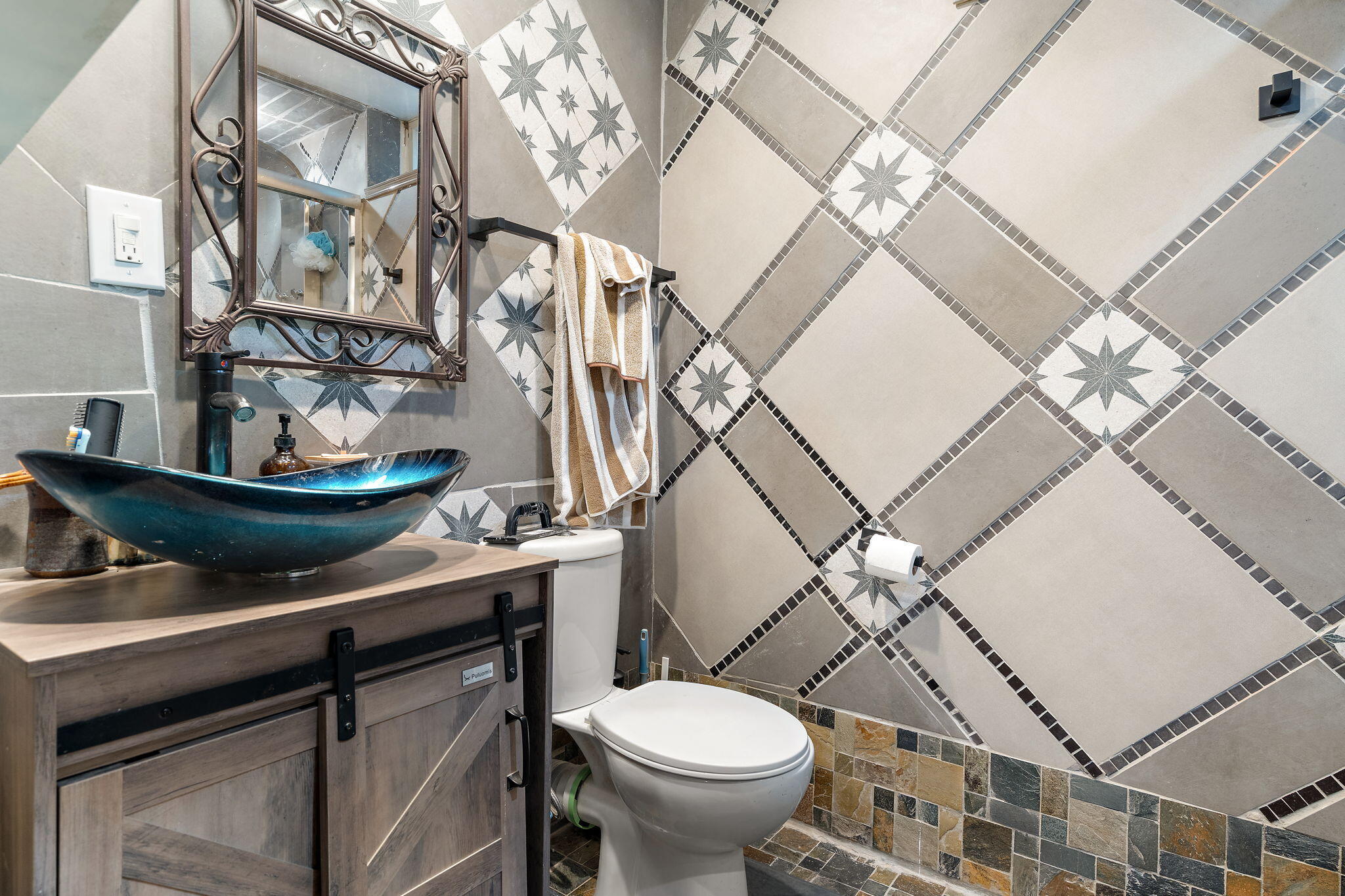 733 South Indiana Avenue Griffith, IN 46319 - Photo 38 of 48 a bathroom with a toilet and a sink