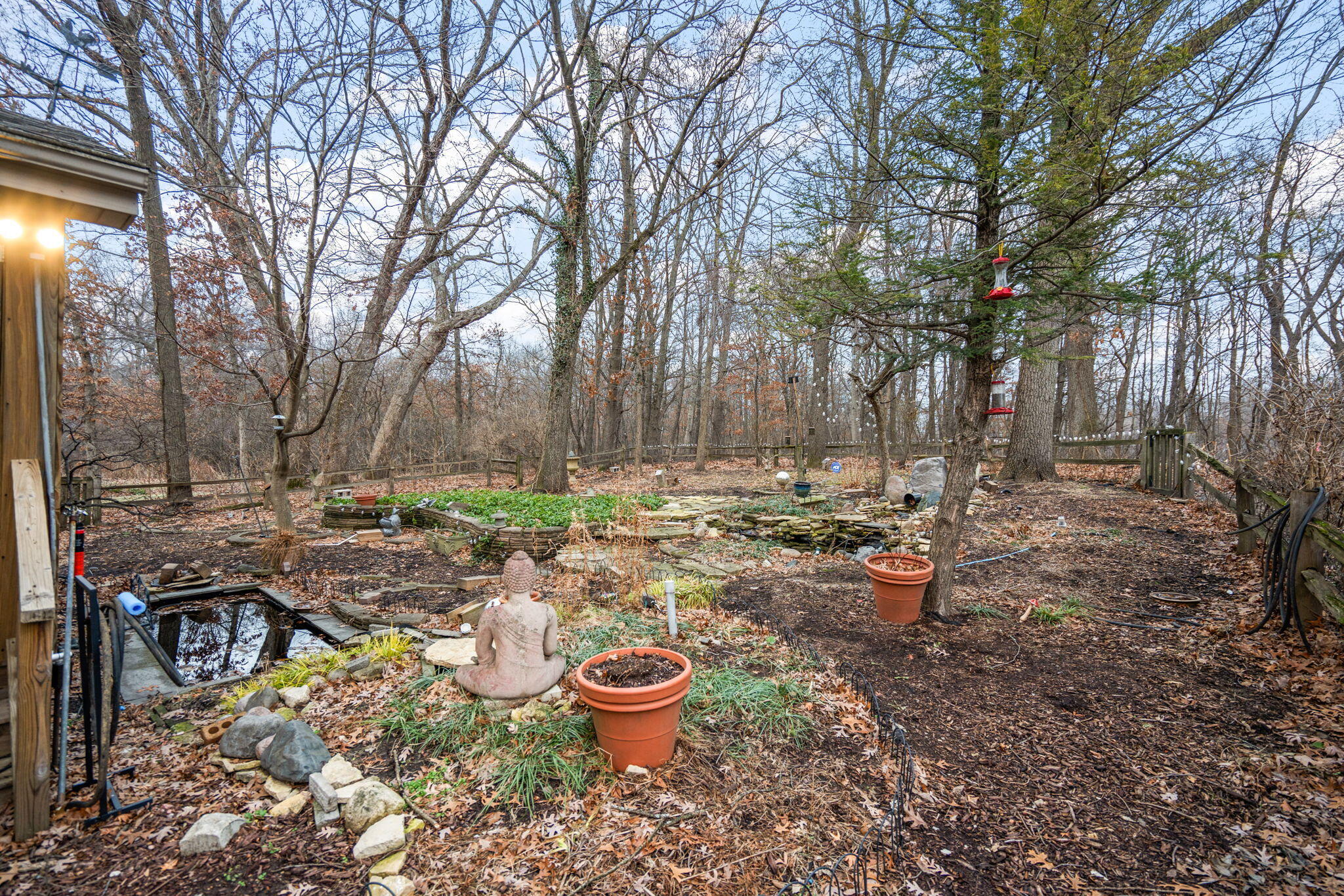 733 South Indiana Avenue Griffith, IN 46319 - Photo 40 of 48 a view of a backyard with table and chairs