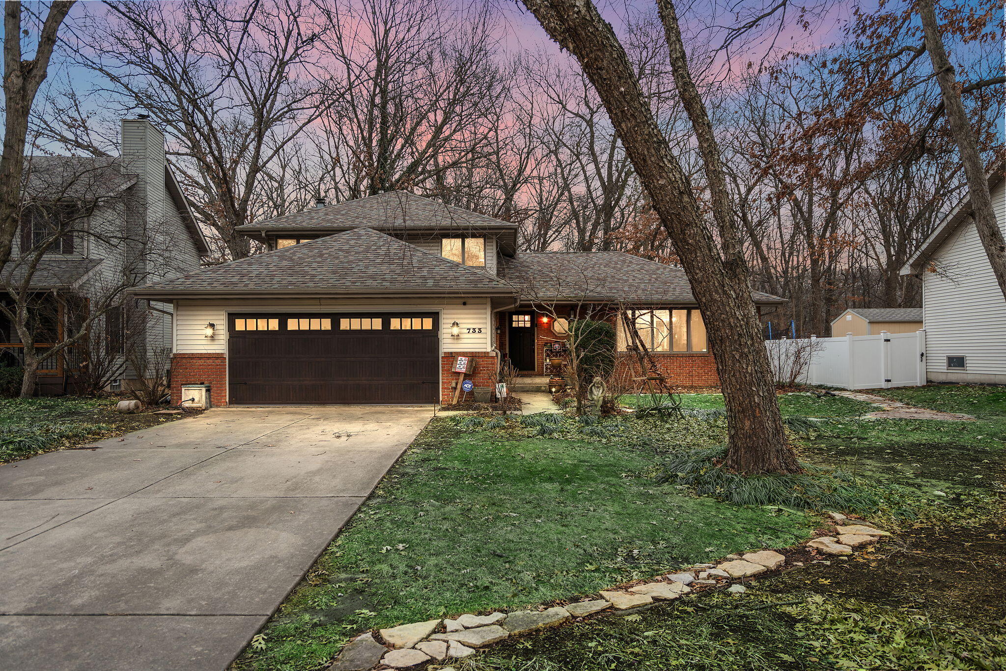 733 South Indiana Avenue Griffith, IN 46319 - Photo 4 of 48 a view of a house with a yard