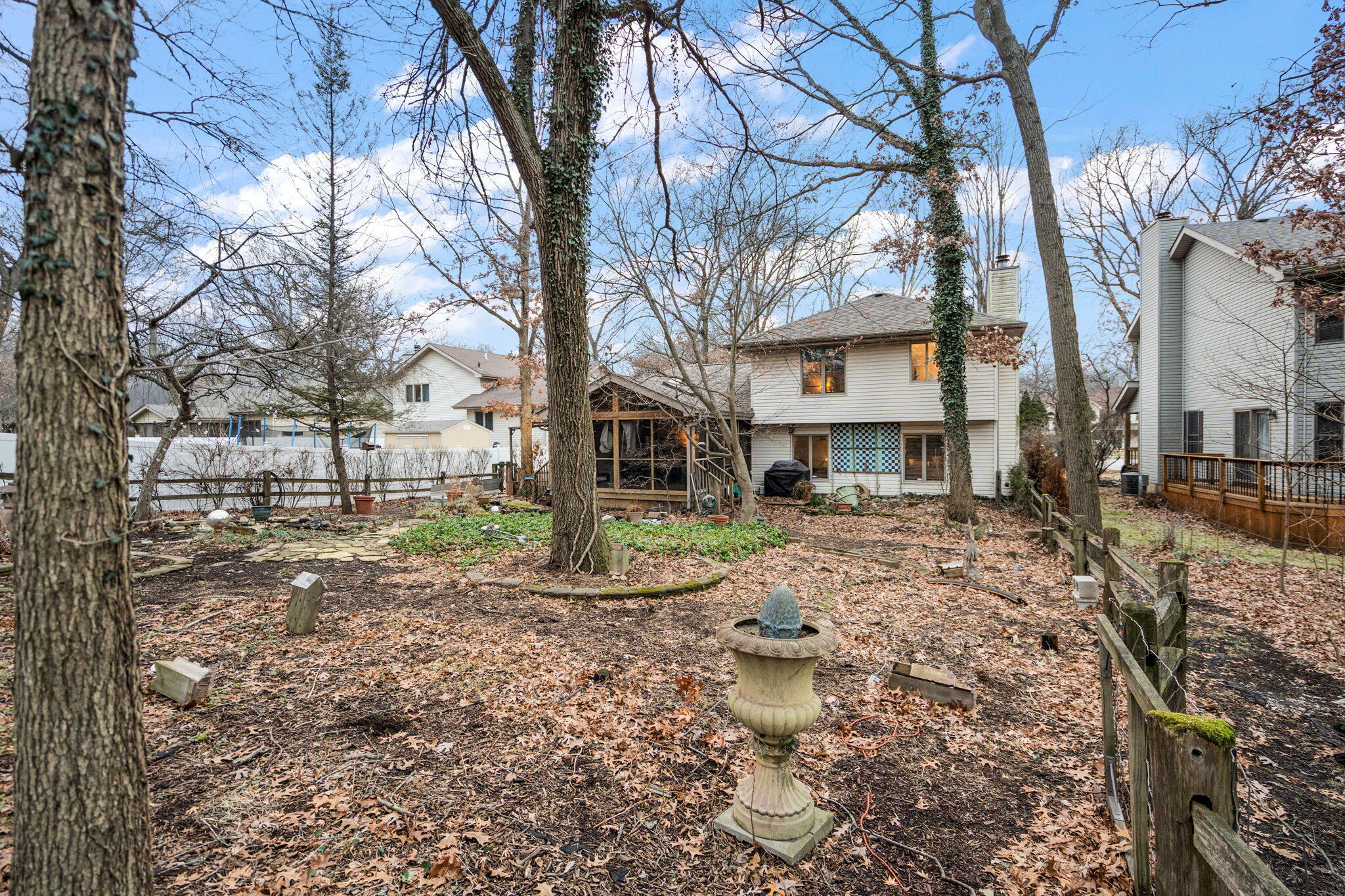 733 South Indiana Avenue Griffith, IN 46319 - Photo 42 of 48 a view of a yard with a house and a tree