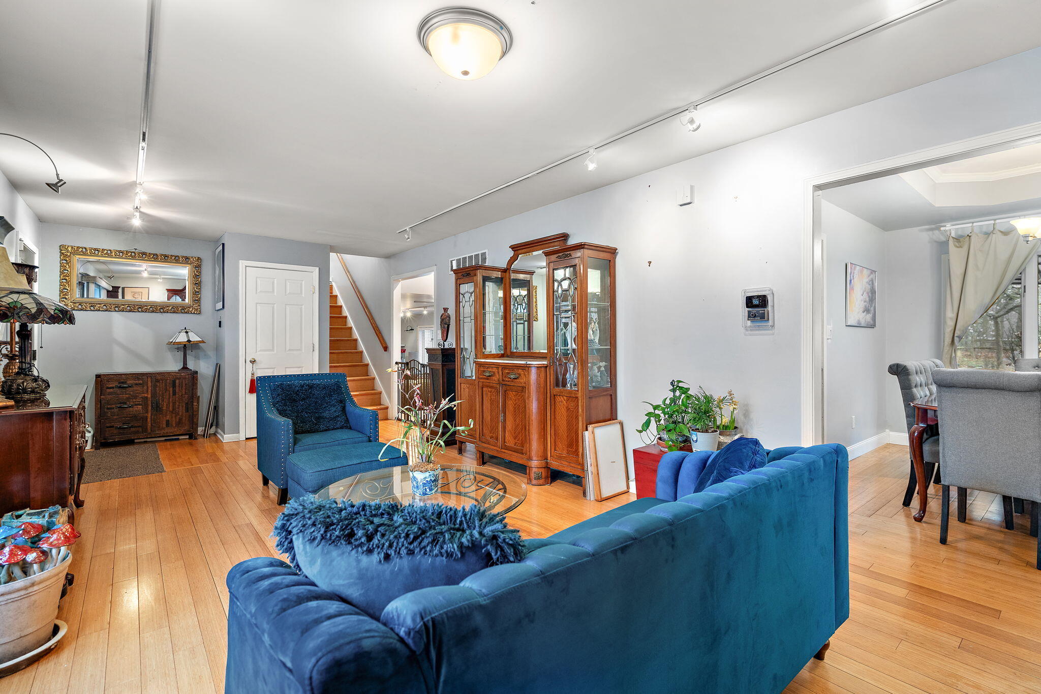 733 South Indiana Avenue Griffith, IN 46319 - Photo 8 of 48 a living room with furniture kitchen view and a fireplace