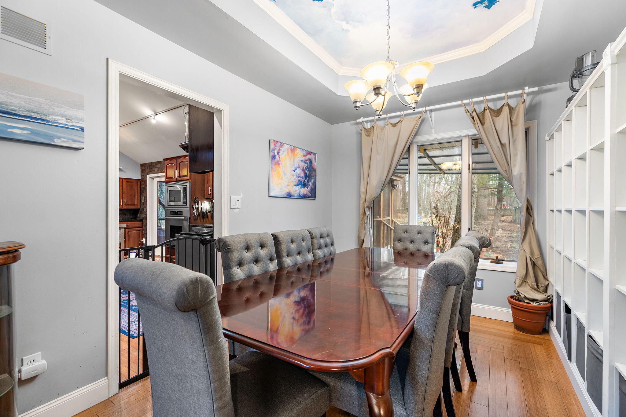 733 South Indiana Avenue Griffith, IN 46319 - Photo 9 of 48 a view of a dining room with furniture wooden floor and chandelier