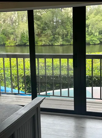 a view of a large window with an outdoor space