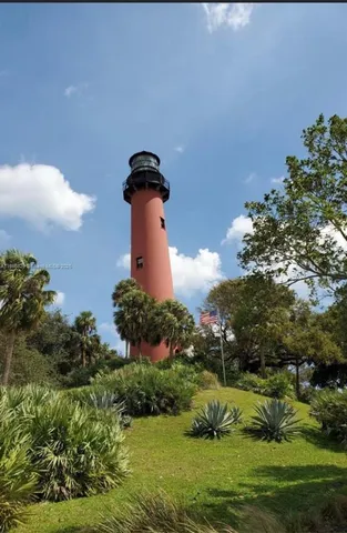 a view of a garden with a fountain