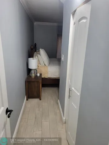 a view of bedroom with a bed