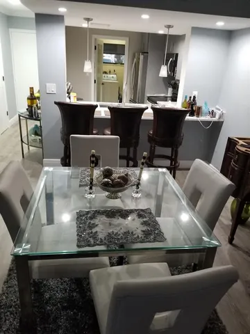 a living room with furniture and a table