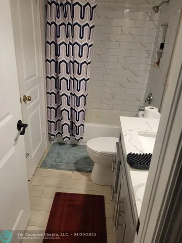 a bedroom with a bed and closet