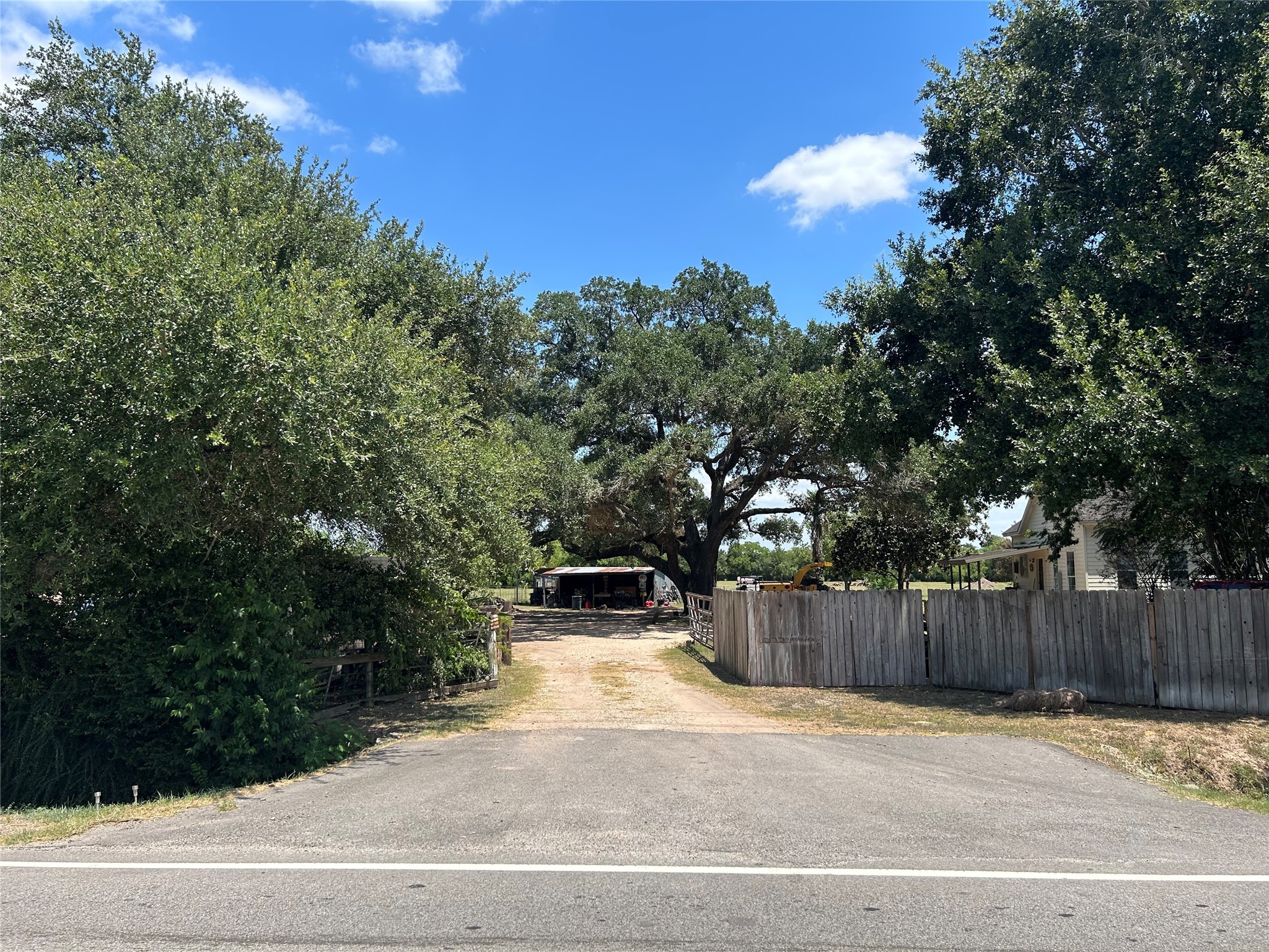19522 Becker Road Hockley, TX 77447 - Photo 2 of 8 a backyard of a house with lots of green space