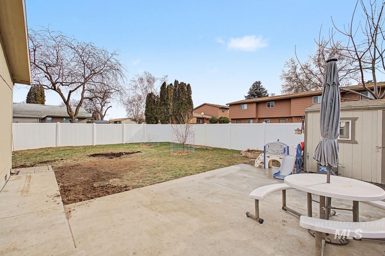 1224 1/2 Burrell Avenue Lewiston, ID 83501 - Photo 25 of 28 Fenced backyard featuring a patio area and an outdoor structure