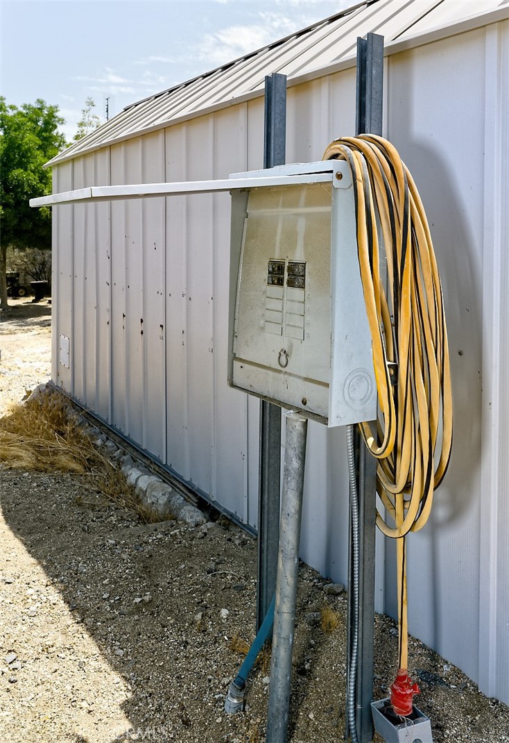 1895 Barkley Ranch Road Pinon Hills, CA 92372 - Photo 30 of 31 a front view of a house with garden