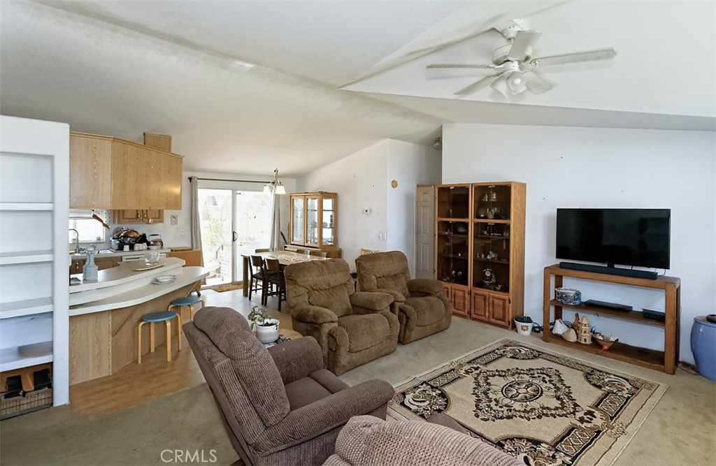1895 Barkley Ranch Road Pinon Hills, CA 92372 - Photo 7 of 31 a living room with furniture and a flat screen tv