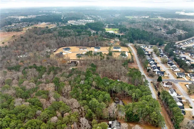 an aerial view of residential house with outdoor space
