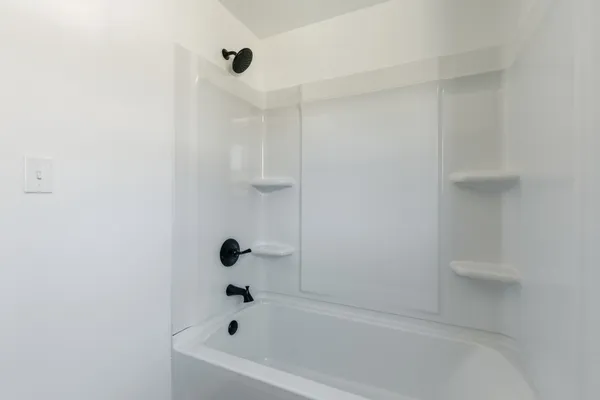 a bathroom with a bathtub