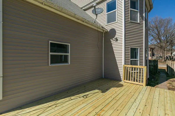 a view of backyard with a balcony
