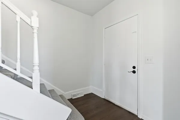 a view of small space with wooden floor