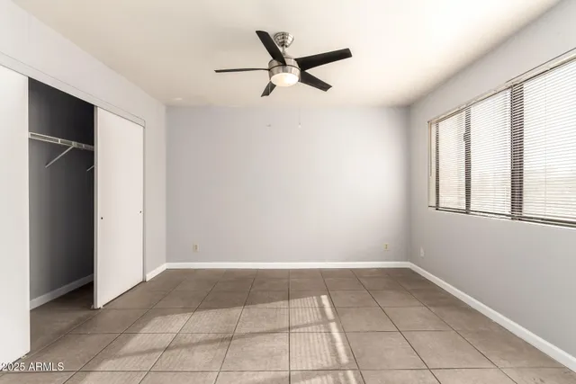 a bathroom with a bathtub and toilet