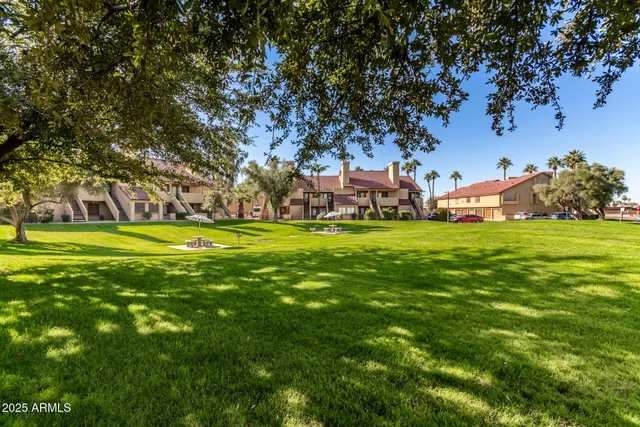 a view of swimming pool with a patio