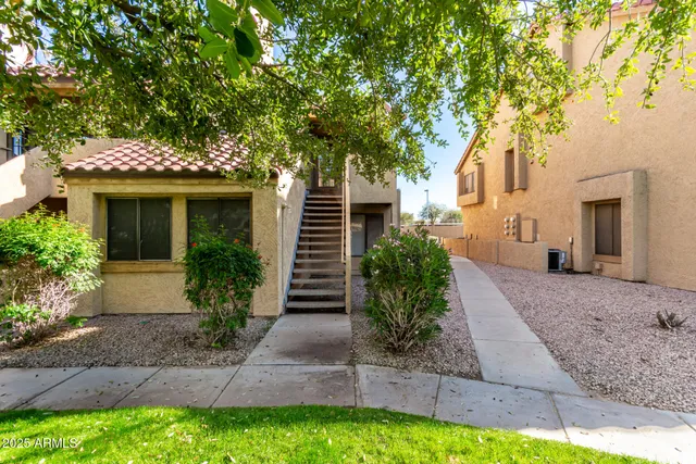 a front view of a house with a garage