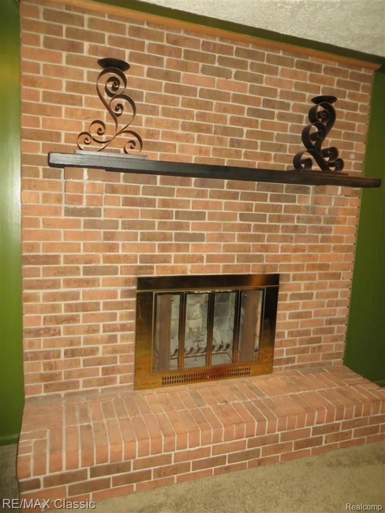 2153 Somerset Road Bloomfield Hills, MI 48302 - Photo 6 of 15 Cozy Natural Fireplace