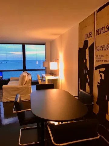 a white stove top oven sitting inside of a kitchen