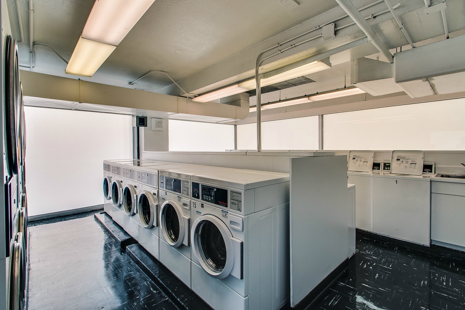 900 North Lake Shore Drive, Unit 1211 Chicago, IL 60611 - Photo 24 of 37 a utility room with dryer and washer