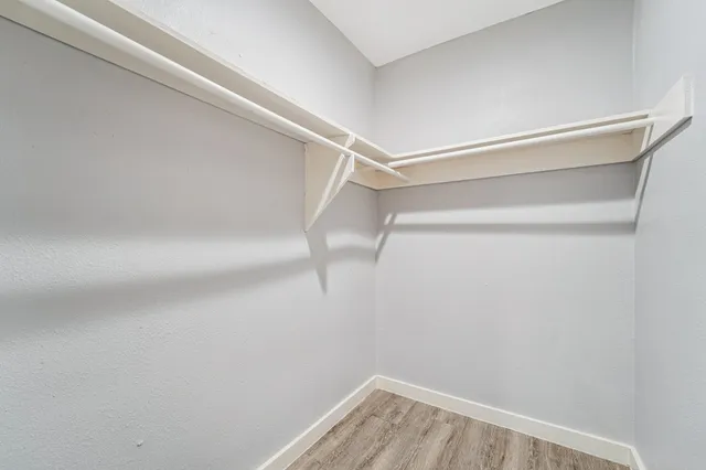 a view of an empty walk in closet