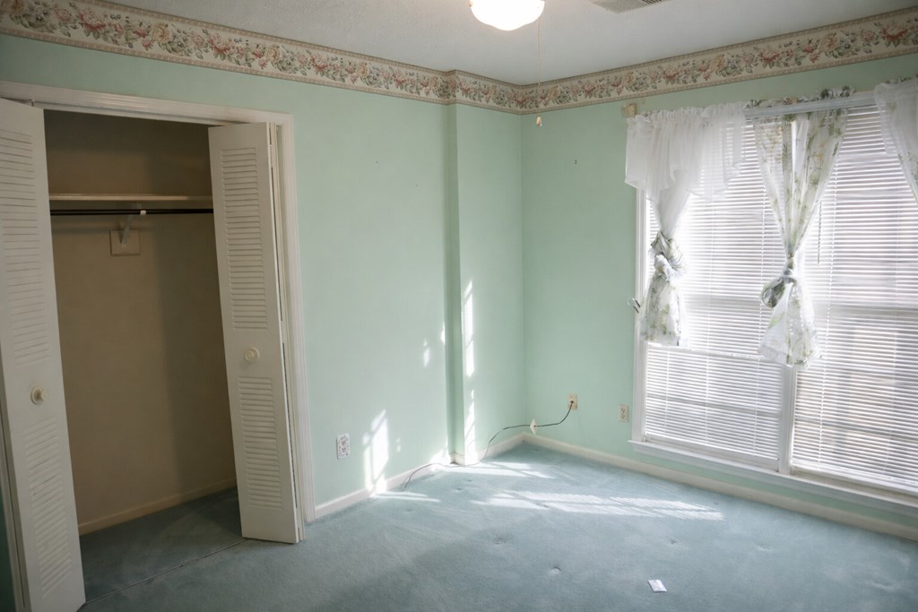 6303 Lemans Lane Columbus, GA 31909 - Photo 12 of 16 a view of an empty room with a window
