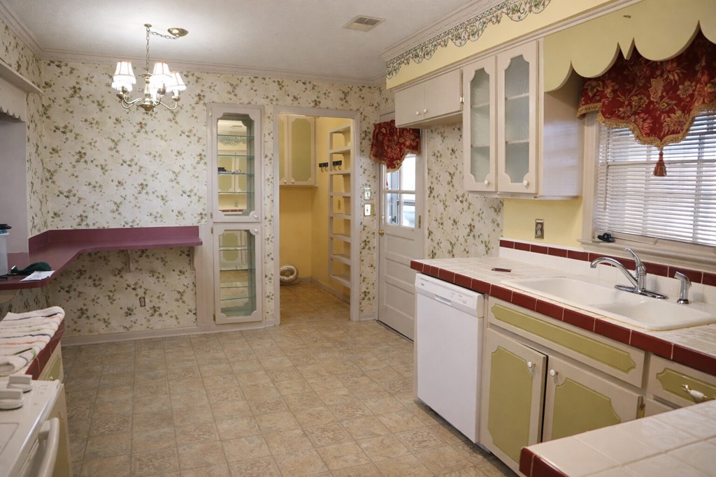 6303 Lemans Lane Columbus, GA 31909 - Photo 14 of 16 a spacious bathroom with a double vanity sink mirror and shower