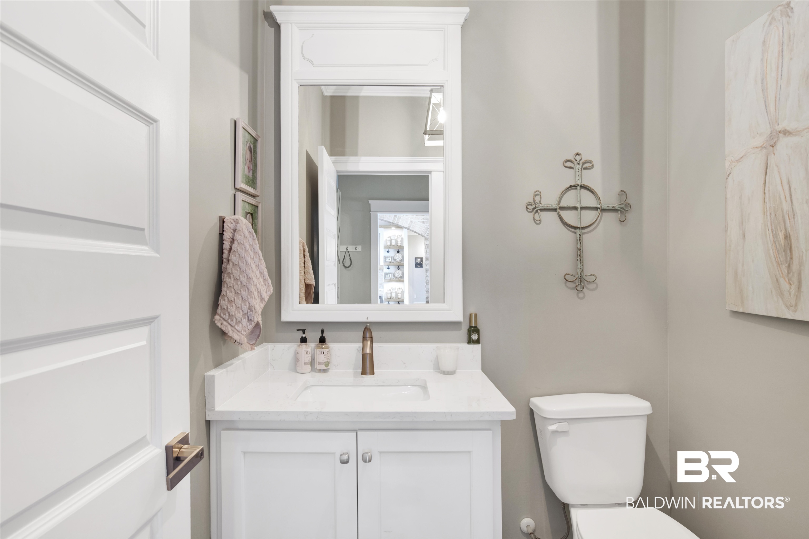 21621 Veranda Boulevard Fairhope, AL 36532 - Photo 18 of 51 Half bath with vanity and toilet