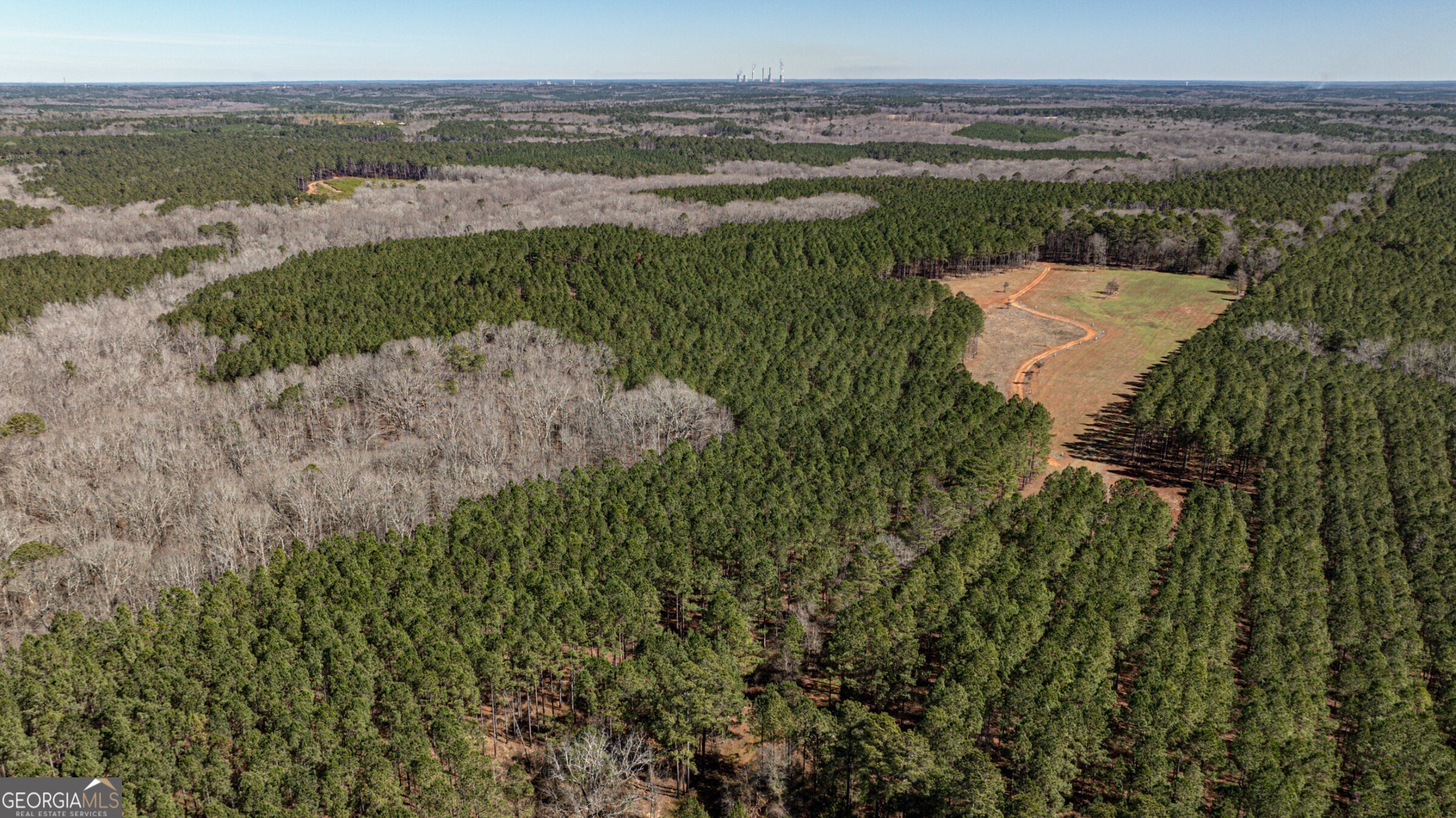 0 Old Zebulon Road Forsyth, GA 31029 - Photo 34 of 60 a view of a lake with a mountain