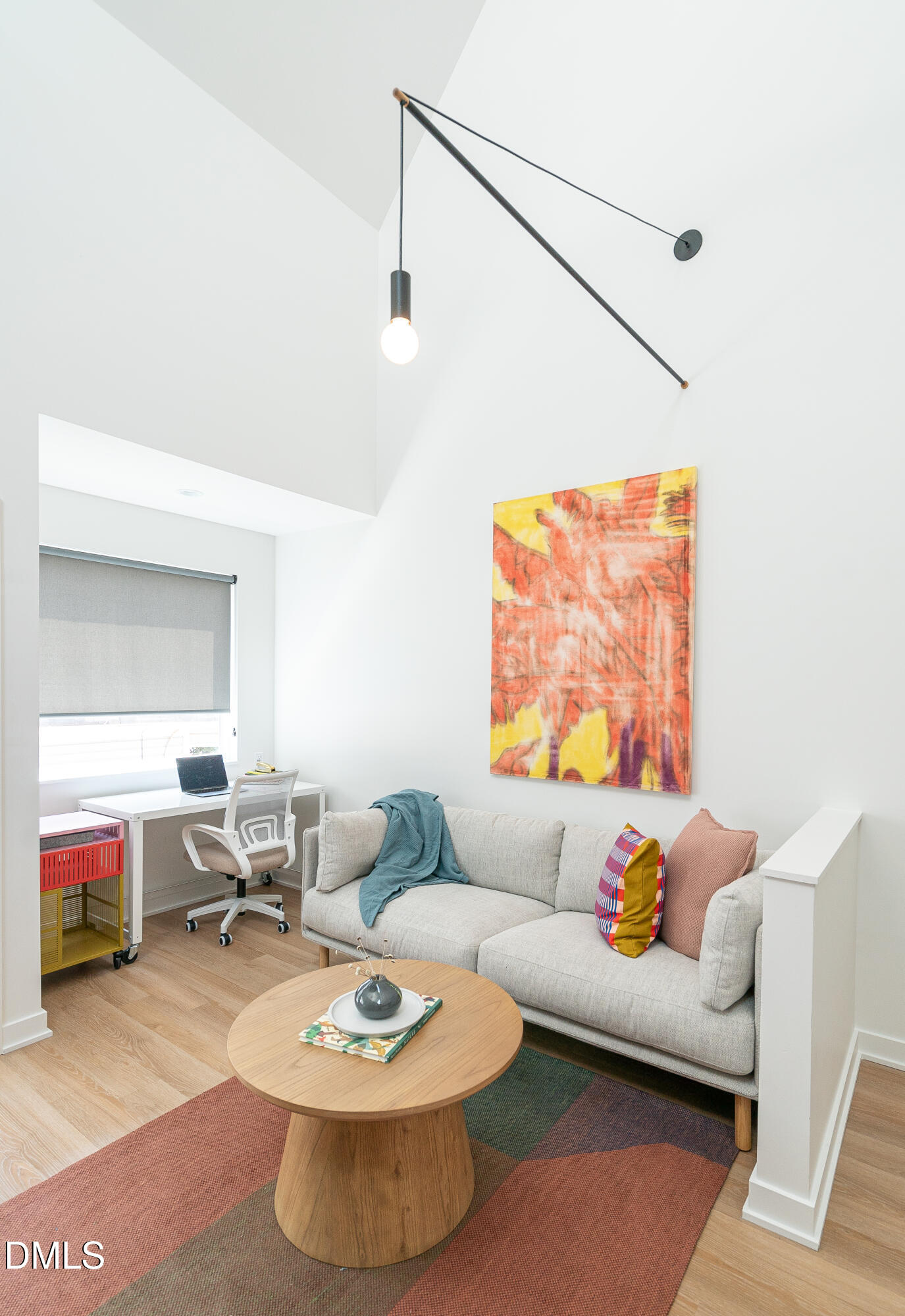 901 East Edenton Street, Unit 7 Raleigh, NC 27601 - Photo 2 of 25 a living room with furniture and a flat screen tv