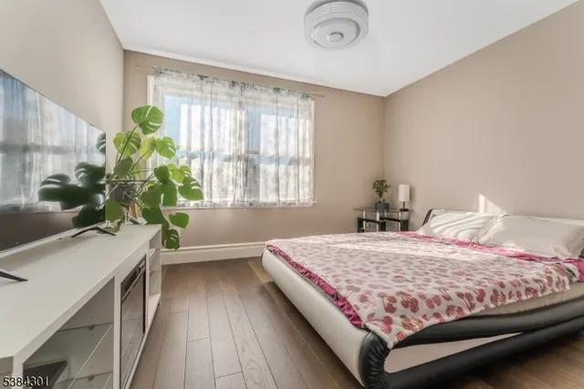 a bathroom with a granite countertop sink a bathtub and shower