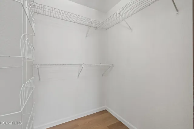 a view of a pathway besides a house