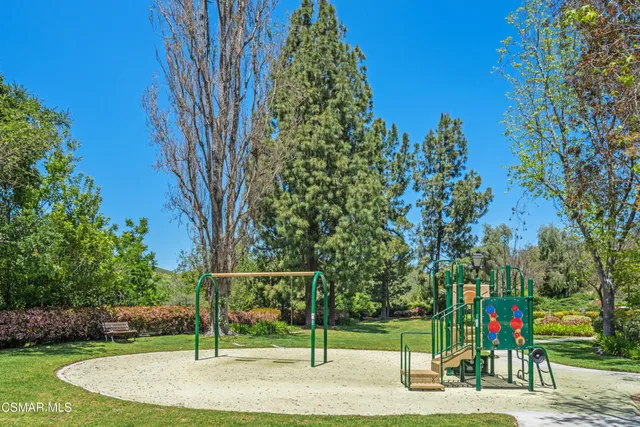 a view of a bench in a garden