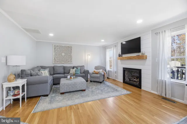 a spacious bedroom with a bed and a window