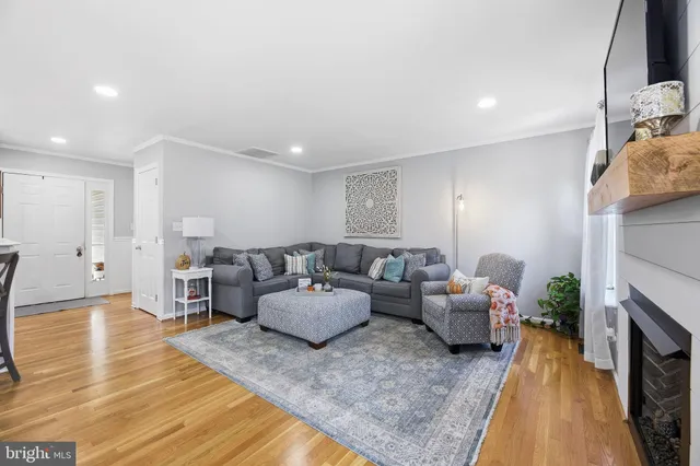 a bathroom with a double vanity sink a mirror and a bathtub