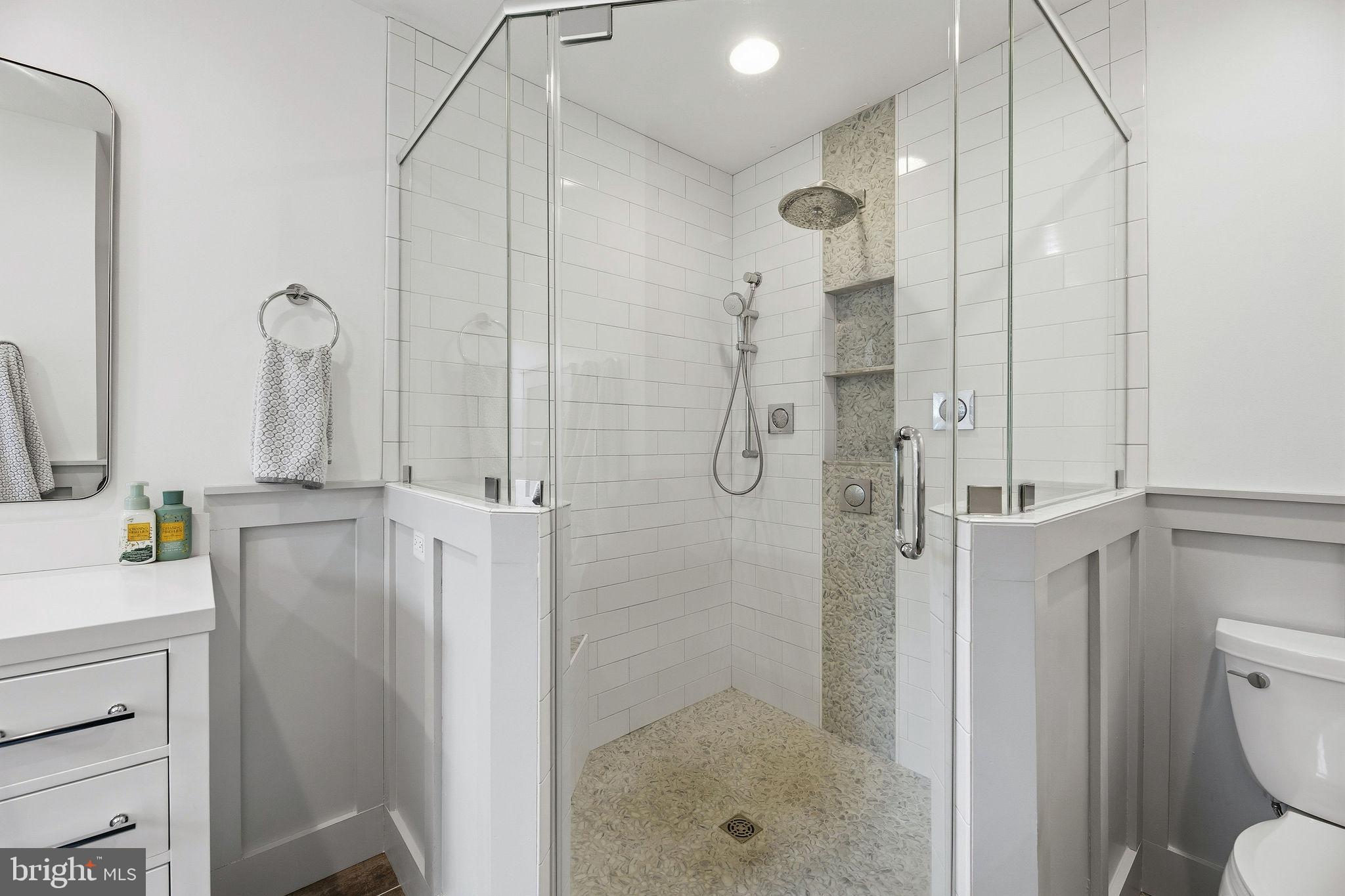 1719 Lottie Fowler Road Prince Frederick, MD 20678 - Photo 20 of 62 a bathroom with a shower toilet and sink