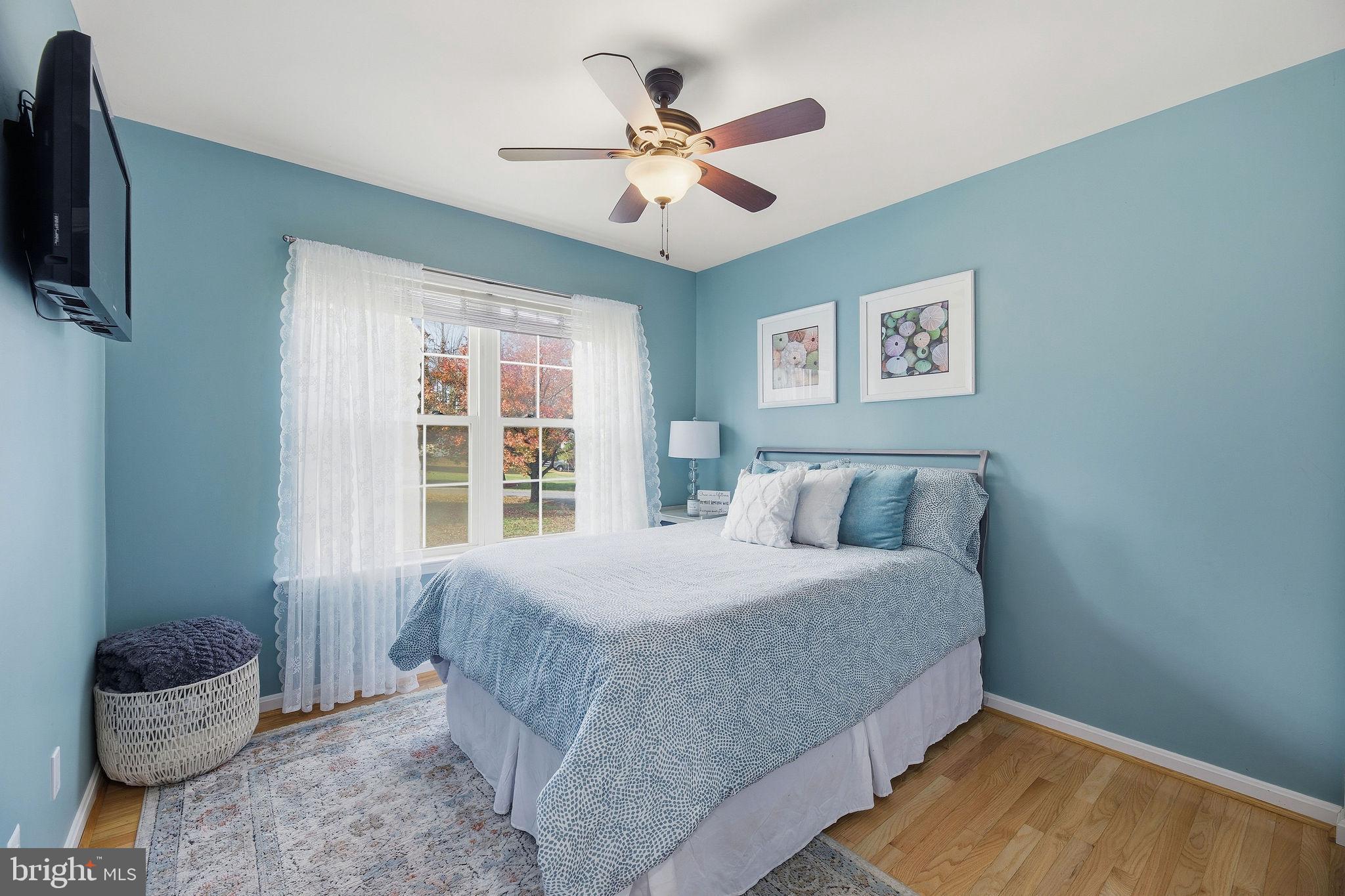 1719 Lottie Fowler Road Prince Frederick, MD 20678 - Photo 24 of 62 a bedroom with a bed and a window