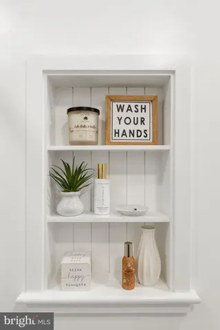 a living room with furniture a pool table and a flat screen tv