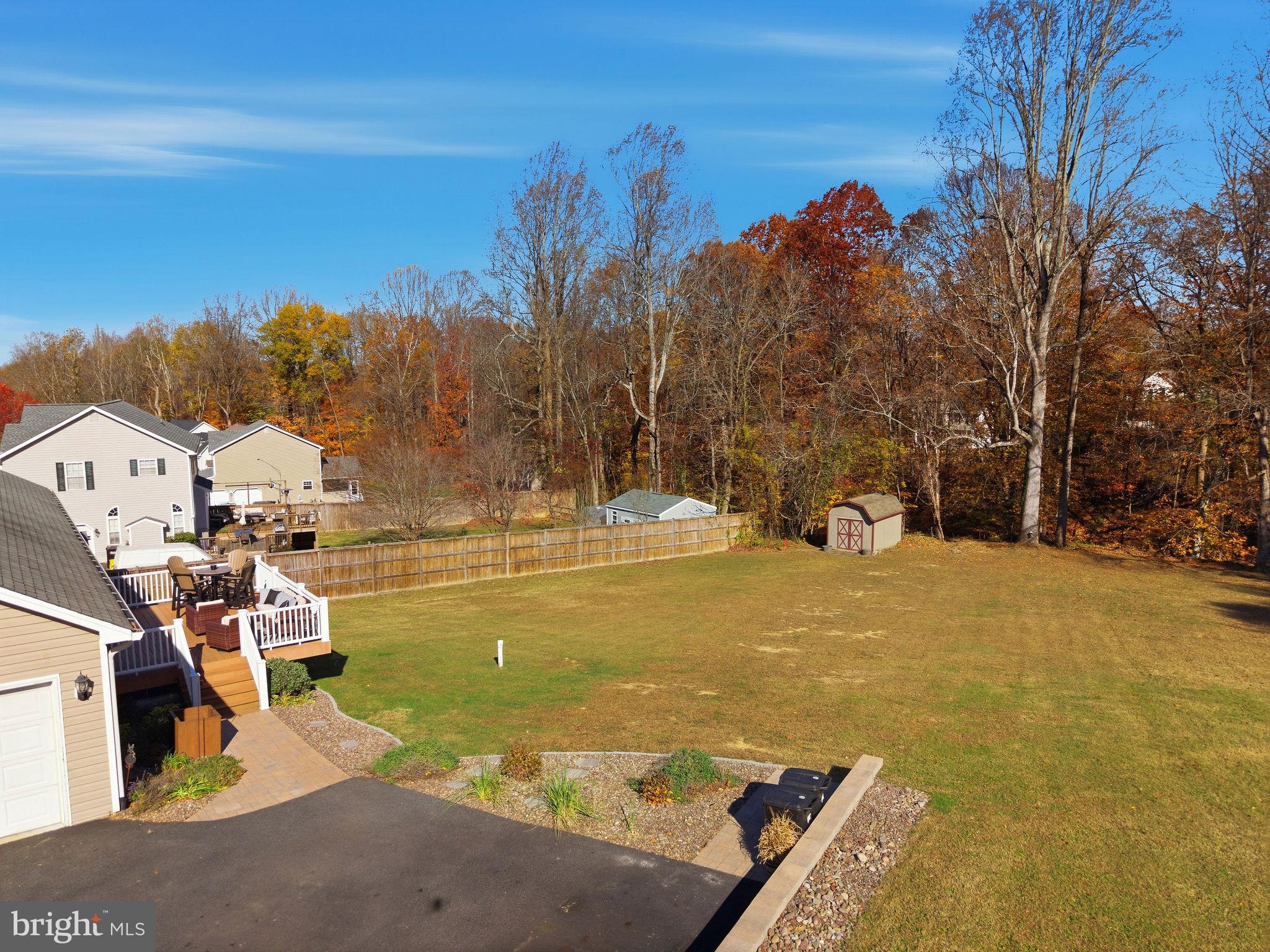 1719 Lottie Fowler Road Prince Frederick, MD 20678 - Photo 46 of 62 a view of a swimming pool with an outdoor space and seating area