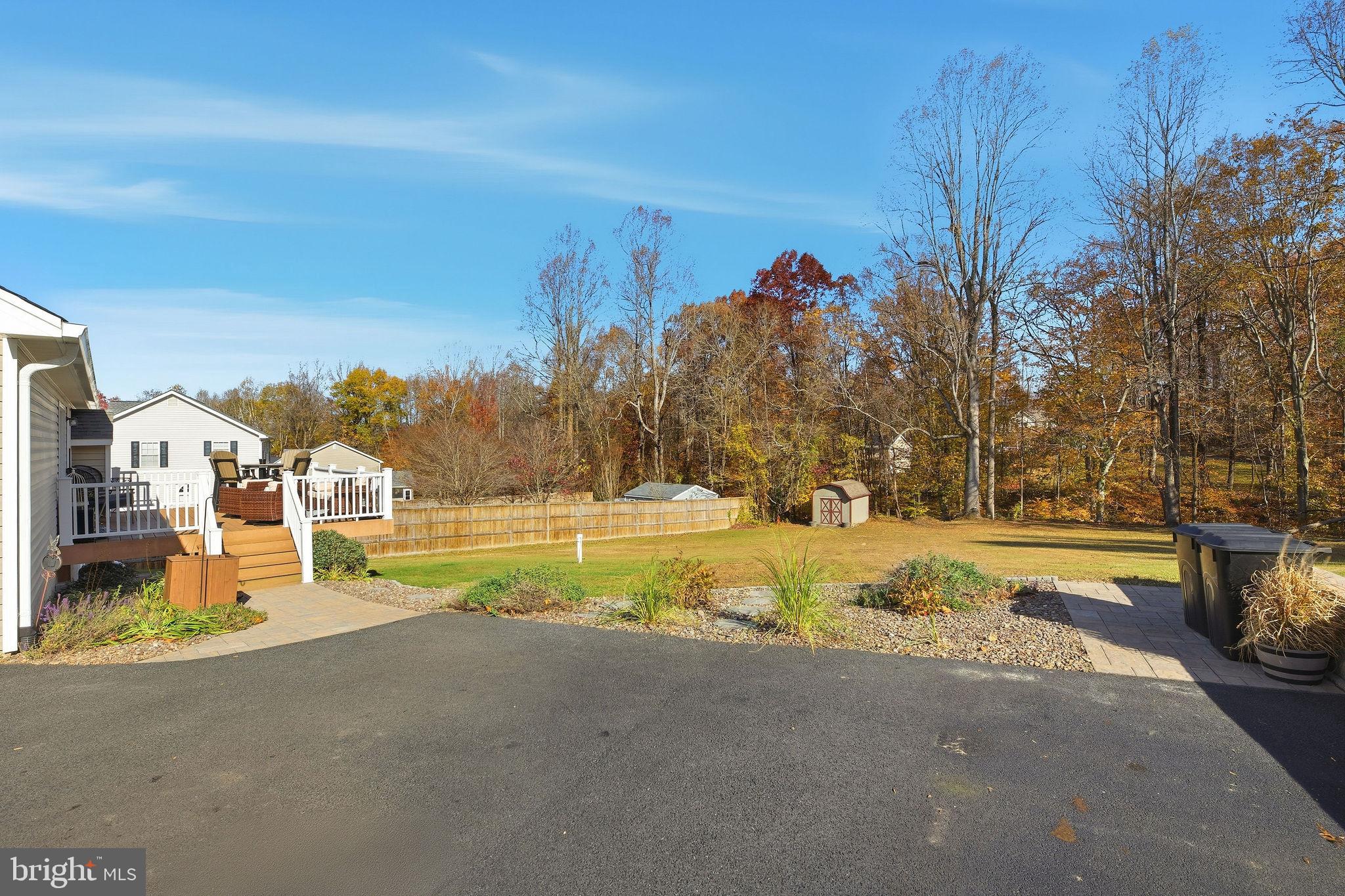 1719 Lottie Fowler Road Prince Frederick, MD 20678 - Photo 47 of 62 a view of a swimming pool with an outdoor space and seating area