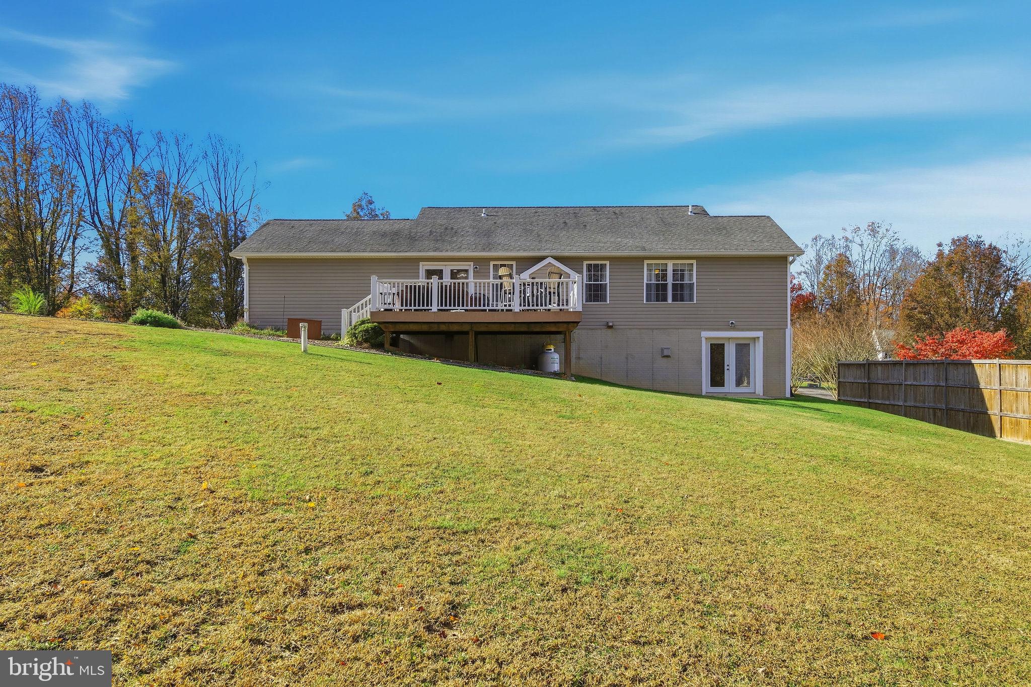1719 Lottie Fowler Road Prince Frederick, MD 20678 - Photo 49 of 62 a view of a house with a yard