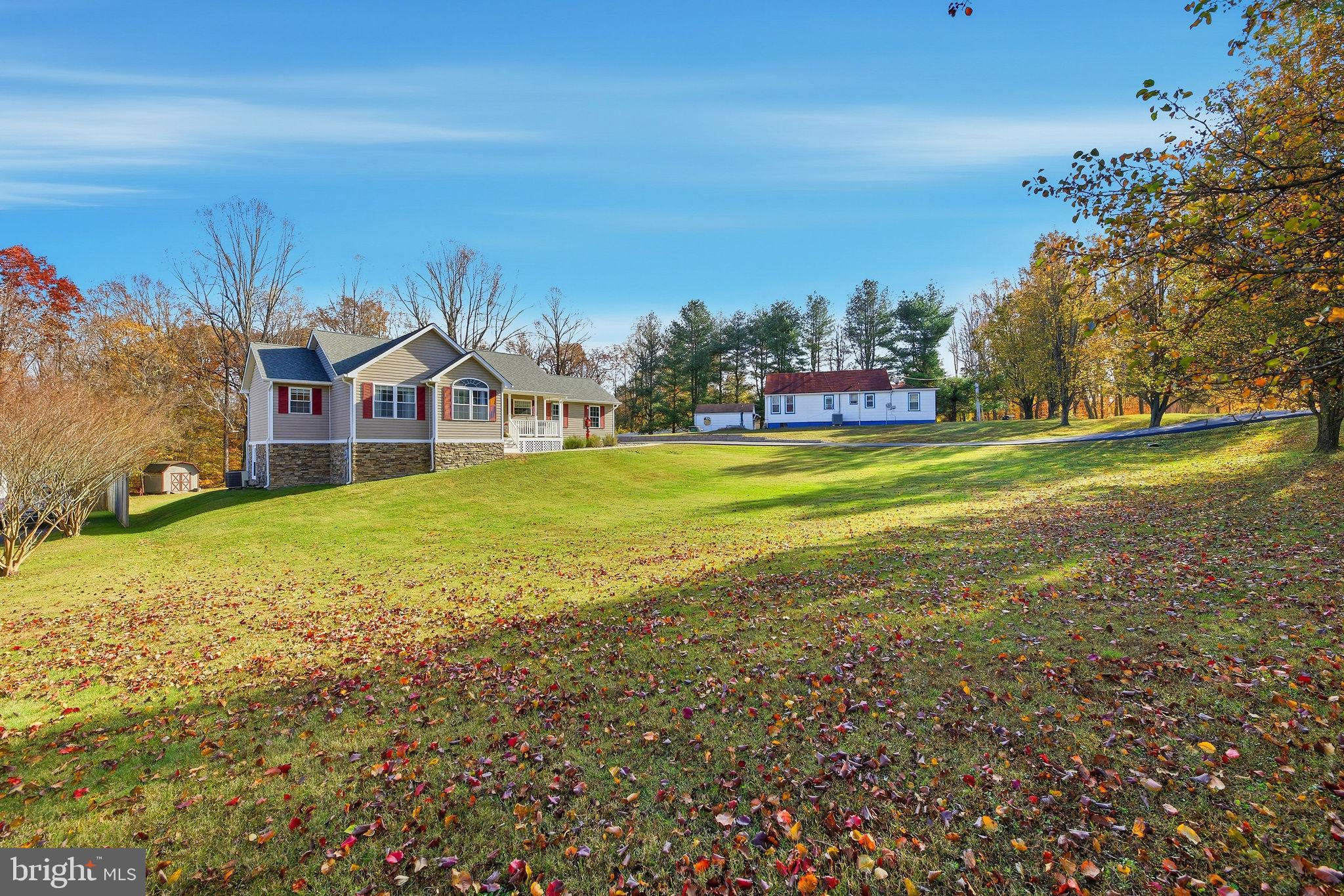 1719 Lottie Fowler Road Prince Frederick, MD 20678 - Photo 55 of 62 a view of a town with floor to ceiling windows and yard