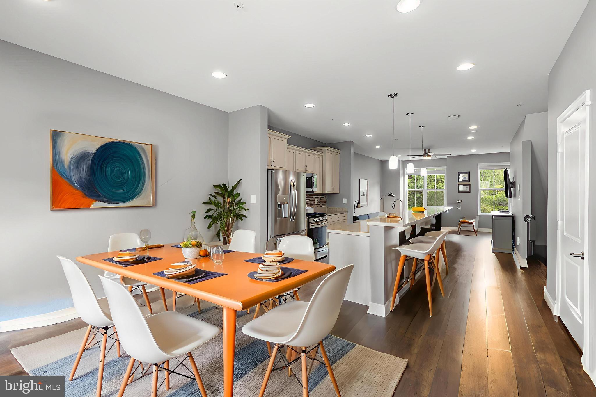 7107 Littlemore Way Hanover, MD 21076 - Photo 12 of 39 a dining room with furniture and wooden floor