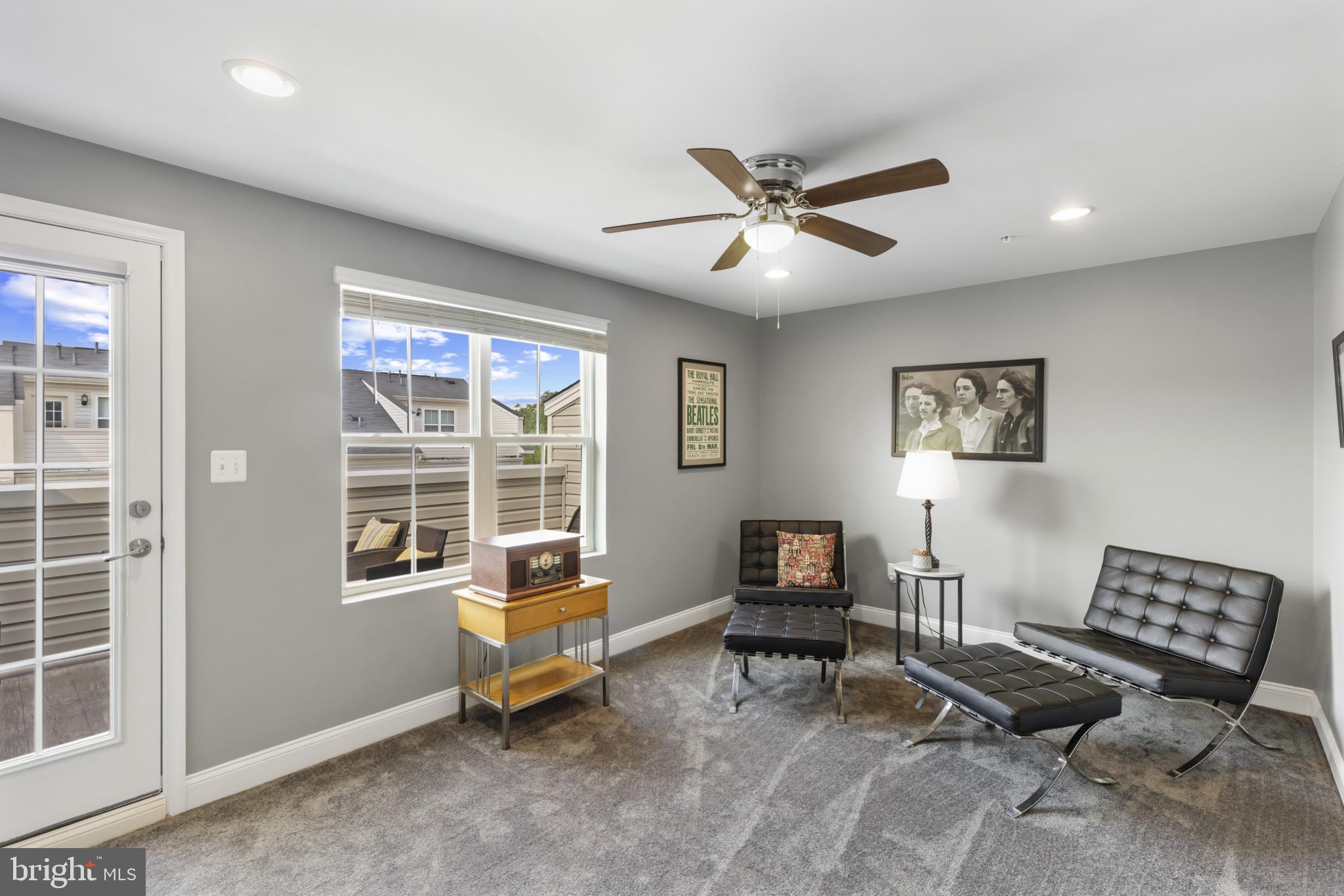 7107 Littlemore Way Hanover, MD 21076 - Photo 30 of 39 a living room with furniture and a window