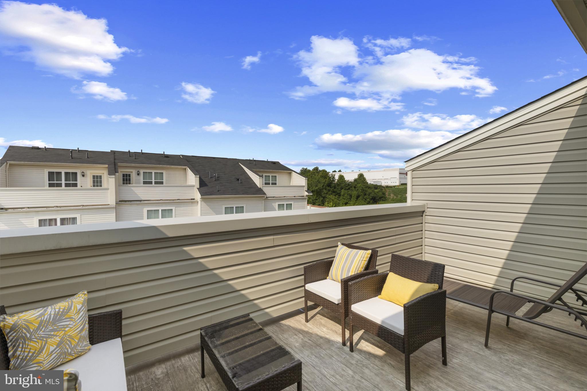 7107 Littlemore Way Hanover, MD 21076 - Photo 32 of 39 a view of a terrace with sitting area