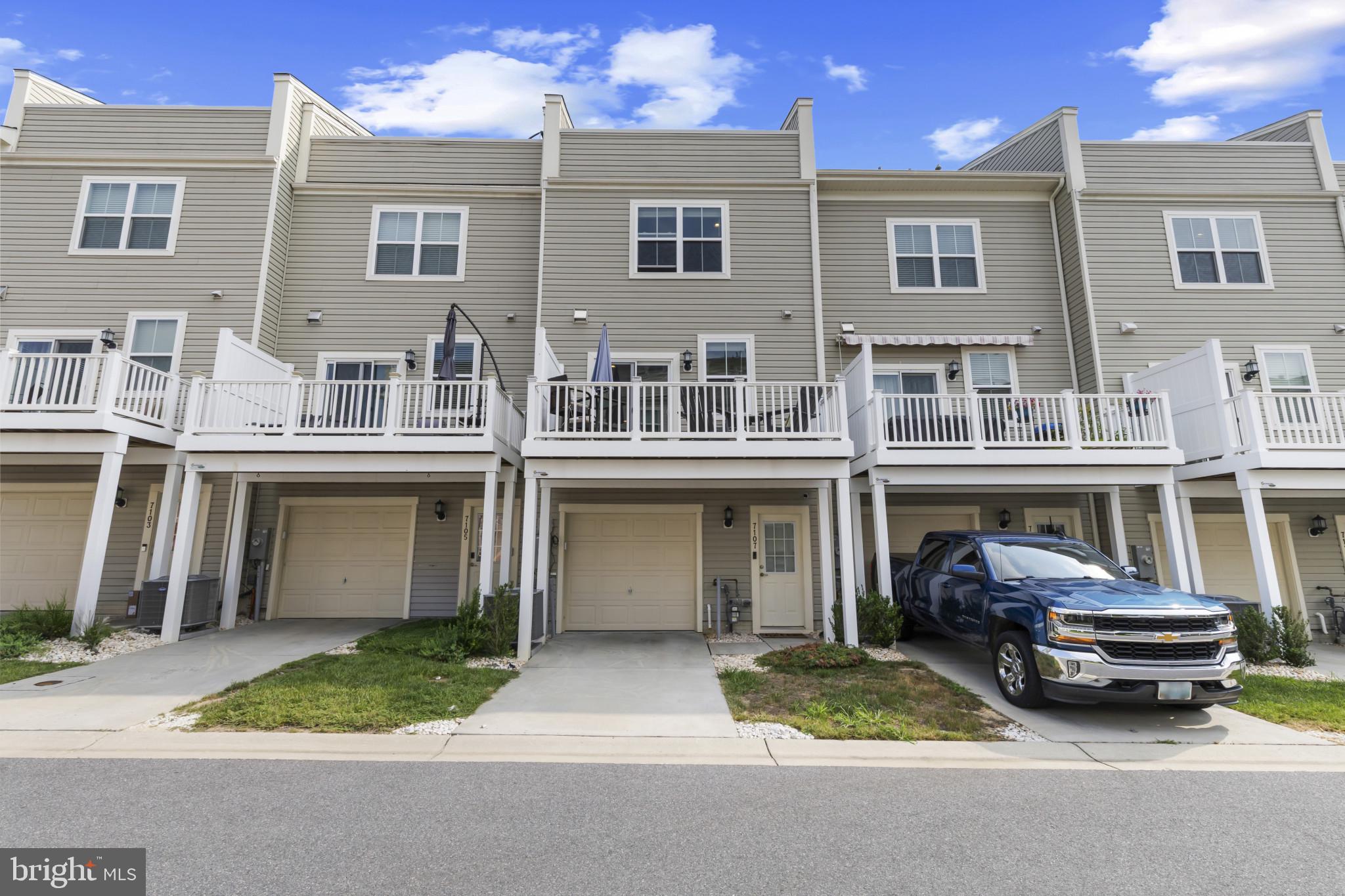 7107 Littlemore Way Hanover, MD 21076 - Photo 37 of 39 a view of a car park in front of a building