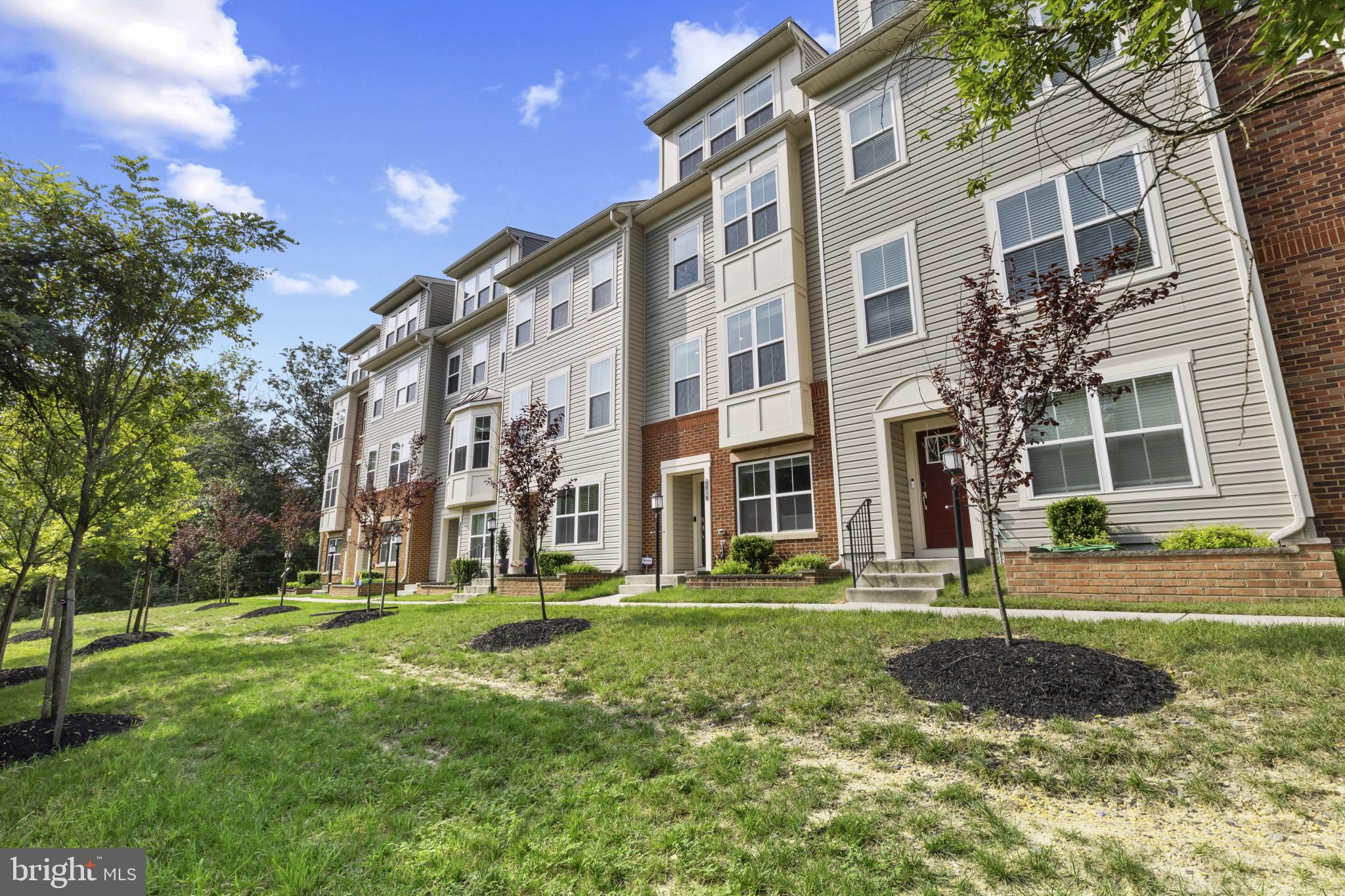 7107 Littlemore Way Hanover, MD 21076 - Photo 39 of 39 a view of a building with a yard