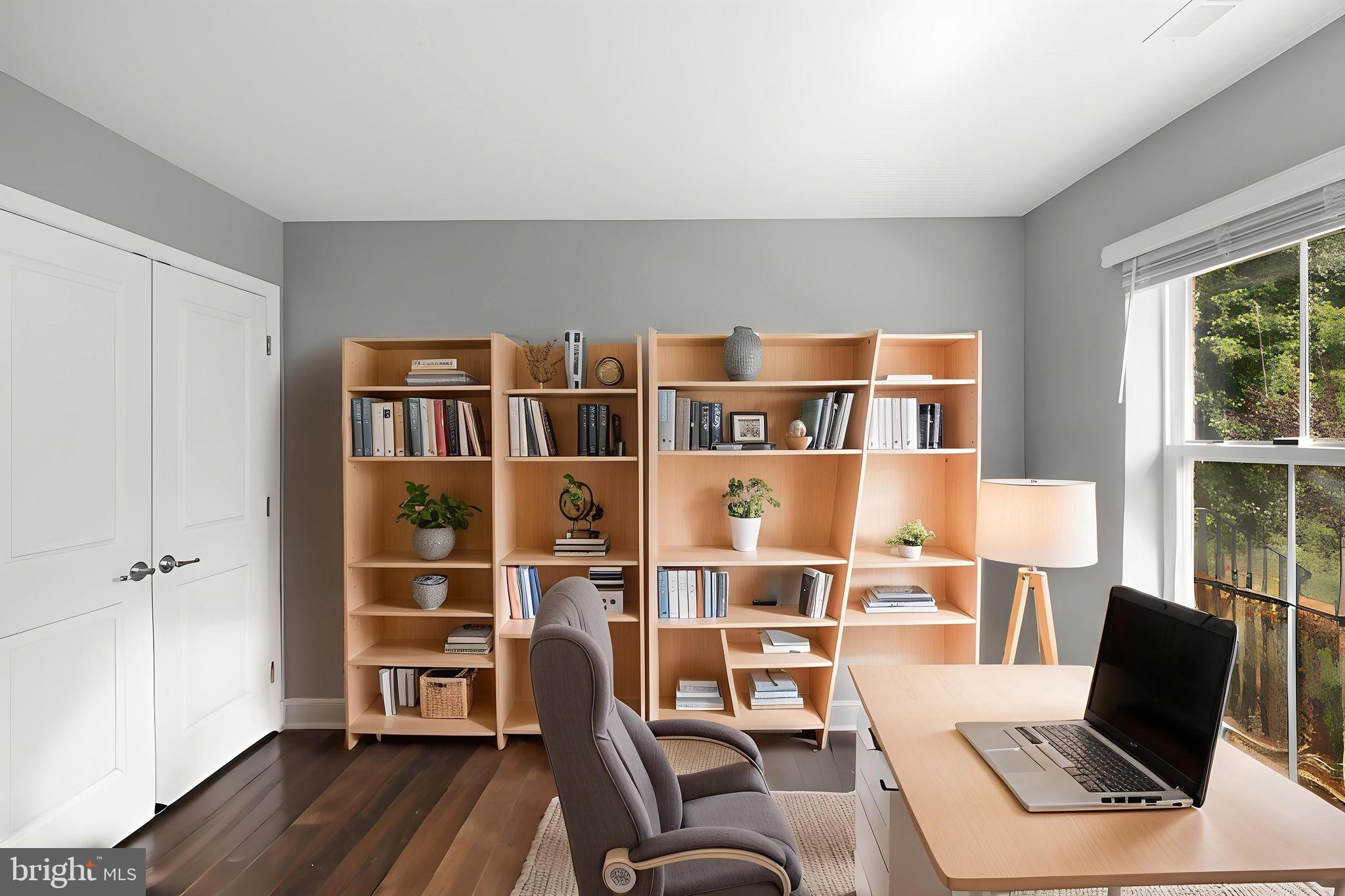 7107 Littlemore Way Hanover, MD 21076 - Photo 4 of 39 a living room with furniture cabinets and a window